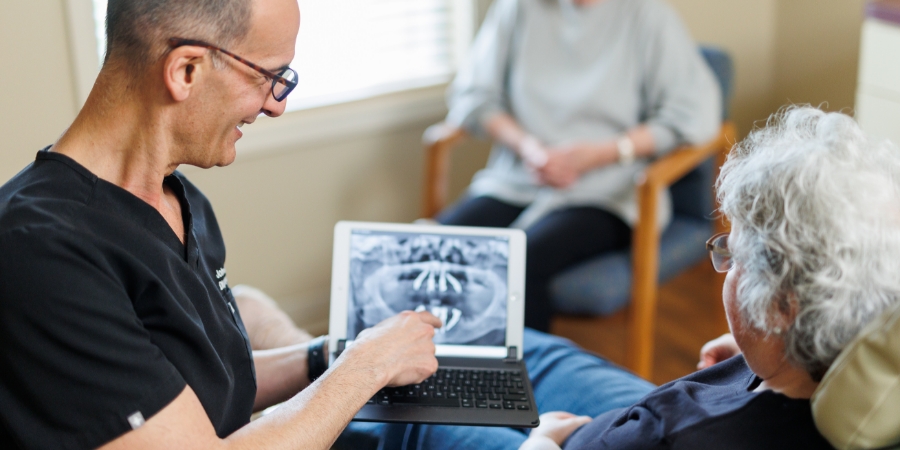 Doctor Showing X ray to Patient